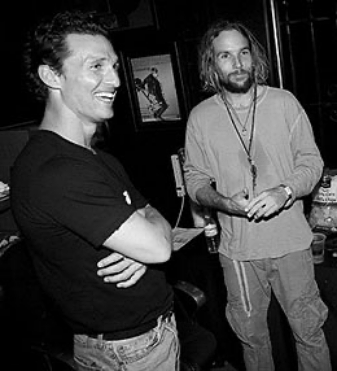 Photo of Matthew McConaughey and Mishka standing together